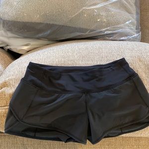 Black Lululemon shorty shorts. Dtr outgrew.